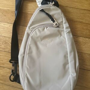 Puma Cream and Black Belt Bag Minimalist Design